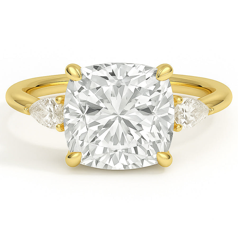 Cushion cut diamond yellow gold three-stone pear engagement ring front view