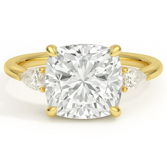 Cushion cut diamond yellow gold three-stone pear engagement ring front view