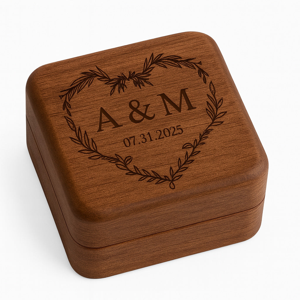 Engraved wooden ring box with heart design initials and date on lid