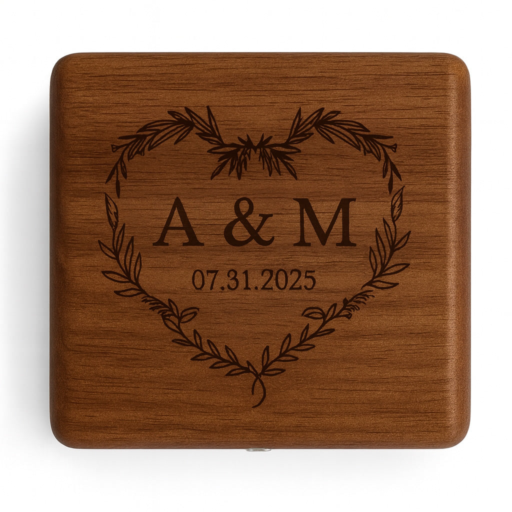 Engraved wooden ring box with initials and date design on lid