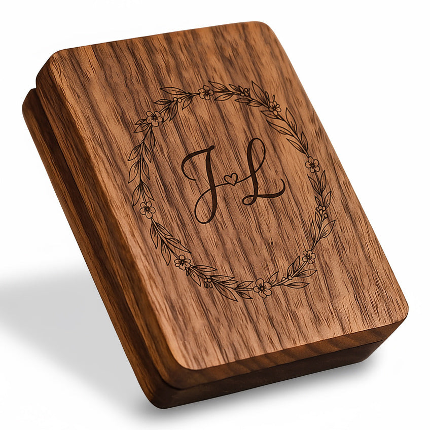 Engraved wooden ring box with floral wreath and initials