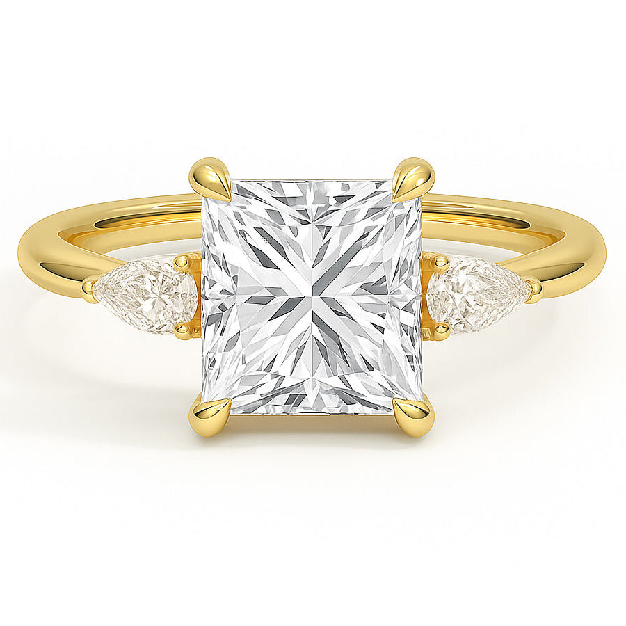 Princess cut diamond yellow gold three-stone pear engagement ring front view
