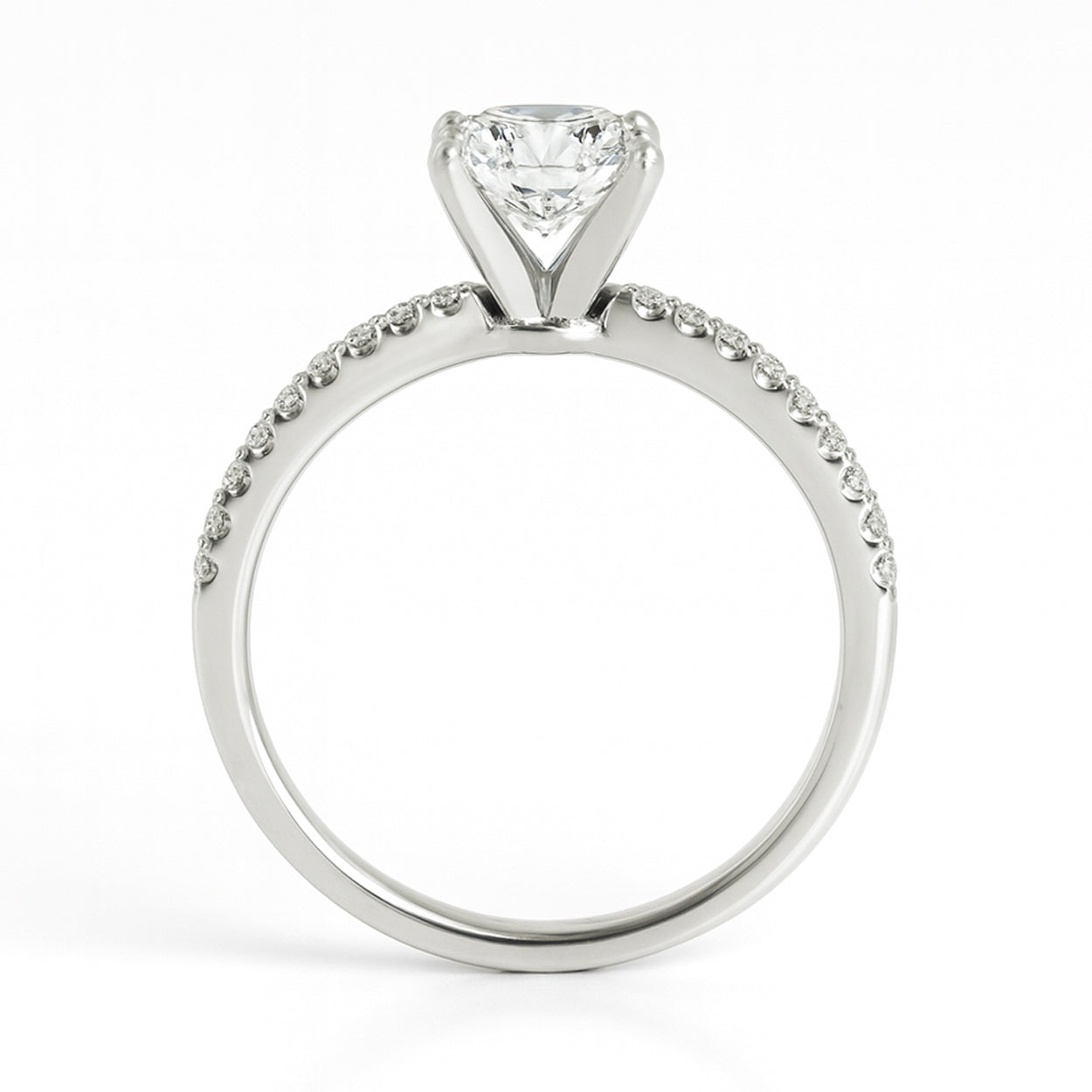 White gold diamond engagement ring showing detailed view of pavé band and setting