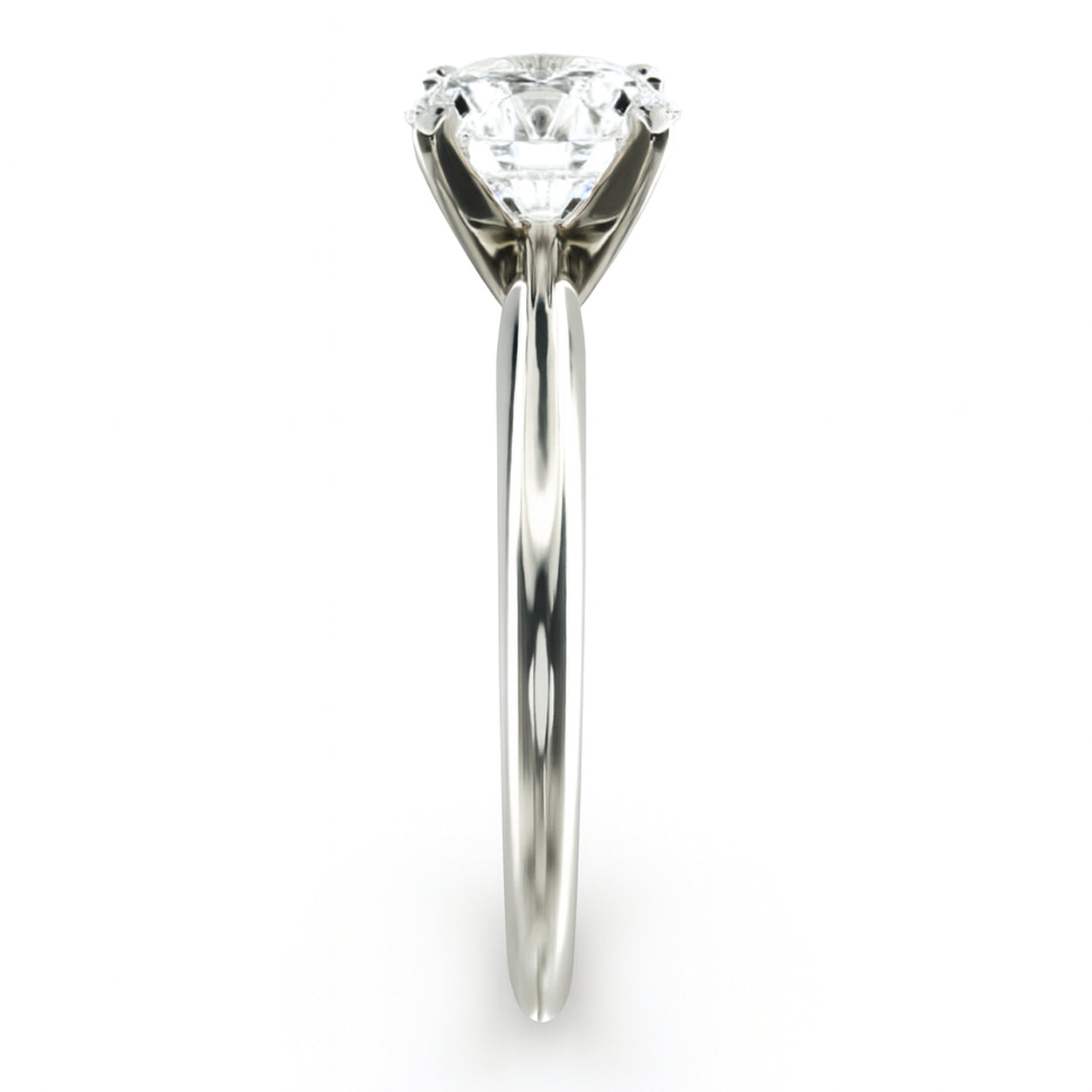 White gold solitaire diamond engagement ring side view showing thin band and prong setting